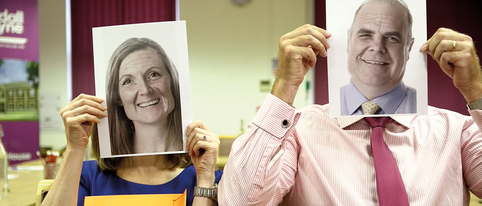 Randall & Payne partners pose for video, created by Mighty, marketing agency Cheltenham