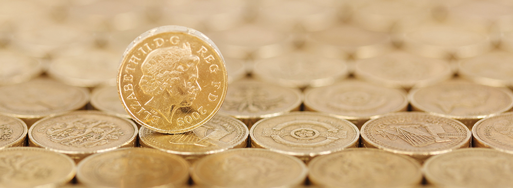 Pound coins, demonstrating value